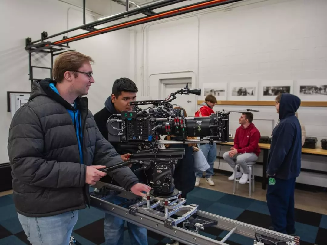 Kyle Knitter with Arri Cinema Camera in rental house